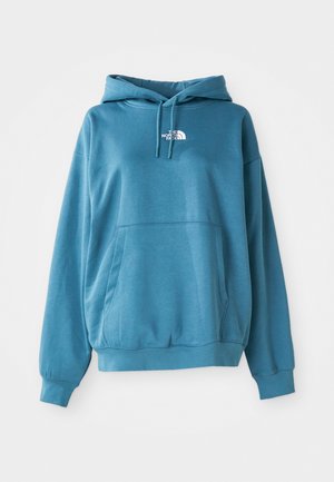 Hooded sweatshirt in teal, featuring a kangaroo pocket, ribbed cuffs, and a small white logo on the chest. Soft, textured fabric.