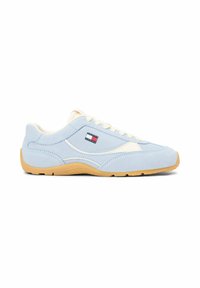 Light blue casual sneaker with white accents, gum sole, lace-up design, and a small rectangular red, white, and blue logo on the side.