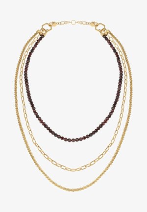 Guld multi-lags halskæde med tre strenge: en med mørke perler, en med ovale led og en fint tvistet guld kæde.