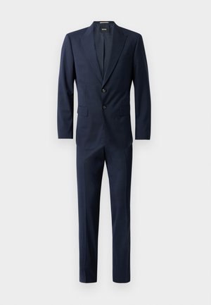 Marineblauwe pak met een slim fit ontwerp, twee knopen, puntige revers en een subtiel geruit patroon. Gemaakt van gestructureerde stof met voorzakken.