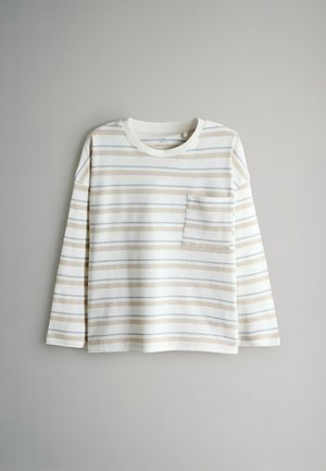 Langærmet skjorte med striber i hvide, beige og blå nuancer. Har rund halsudskæring og brystlomme. Blødt bomuldsstof og afslappet pasform.
