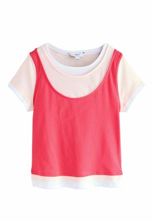 White short-sleeve T-shirt with attached red sleeveless tank top layered over it, featuring a scoop neckline and straight hem.