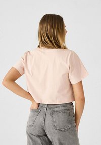 JOTT MAZU MELOCOTÓN CLARO Y CUELLO REDONDO - T-shirt basique - rose