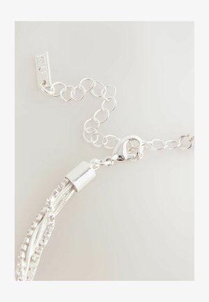 Silver chain necklace featuring a lobster clasp, interlocking links, and textured accents. Includes smooth metal caps and hanging strands.