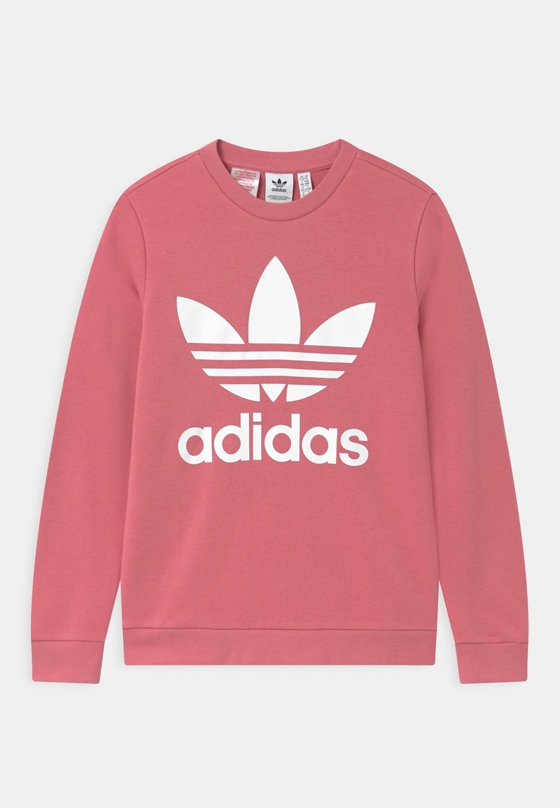 Sweatshirt en coton rose à manches longues, col rond, avec un grand logo adidas blanc et trois bandes parallèles sur un design de feuilles.