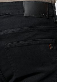 BOSS DELAWARE - Jeans Slim Fit - black three
