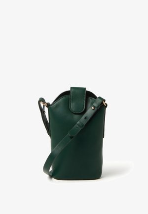 Green leather crossbody bag with a structured shape, rounded top, flap closure, and an adjustable strap. Features gold-tone hardware accents.