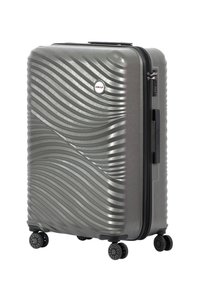 Gray hard-shell suitcase with wavy textured surface, retractable handle, and four black multi-directional wheels for easy maneuverability.