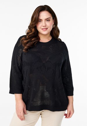 Black knitted sweater with a textured open weave pattern, featuring three-quarter sleeves and a ribbed neckline and hem.