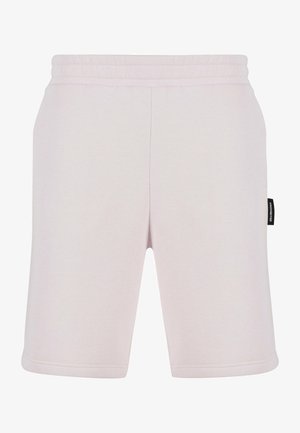 Lyserøde bomuldsshorts med elastisk liv, lige snit og et lille sort mærke på siden. Glat tekstur, ingen lommer.