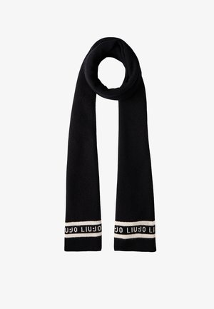 Sciarpa nera lavorata a maglia con una texture a coste, caratterizzata da una fascia crema a entrambe le estremità con la scritta del marchio. Materiale morbido, forma rettangolare allungata.