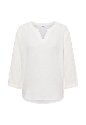 Hvid strukturbluse med 3/4-ærmer, V-udskæring og afslappet pasform, med mærket "Cecil" på indersiden af kraven.