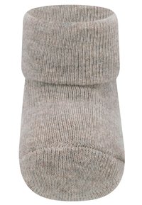 Calzino per bambino color beige chiaro con bordo a coste, realizzato in tessuto lavorato a maglia, con punta arrotondata e texture morbida. Senza fantasie o dettagli aggiuntivi.