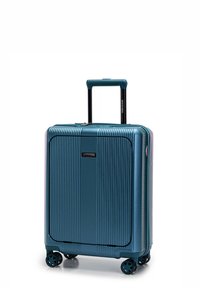 Tvrdý kufr v barvě zelenomodr�é s vertikálními žebrováními, vysouvací rukojetí a čtyřmi otočnými kolečky pro snadnou manipulaci. Výrazně zobrazené logo značky.
