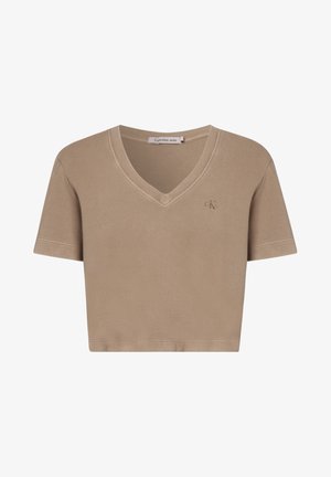 Béžové krátké tričko s výstřihem do V, krátkými rukávy a texturovaným vzorem. Na přední straně je malý vyšitý nápis 'CK'.