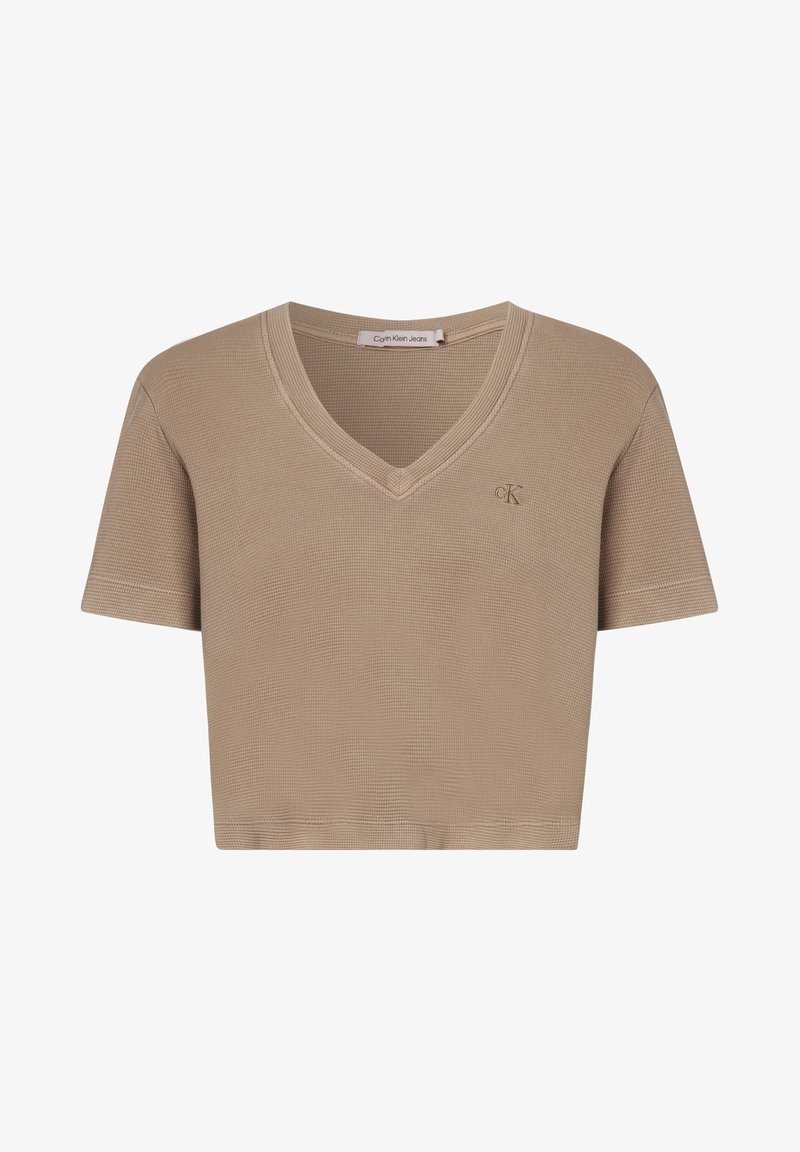 Béžové krátké tričko s výstřihem do V, krátkými rukávy a texturovaným vzorem. Na přední straně je malý vyšitý nápis 'CK'.