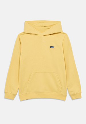 Felpa con cappuccio gialla in cotone, con tasca frontale, cappuccio regolabile con coulisse e un piccolo logo Levi's blu sul petto. Tessuto dalla texture liscia.