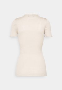 Fitted short-sleeve beige ribbed knit top with a subtle ruffled edge on sleeves and neckline, shown from the back.