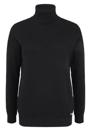 Mustakane svergu, valmistatud tekstureeritud kudumiskangast. Omab pikki varrukaid, soonikukäe- ja -aluse äärt, millel on külje peal väike brändi silt.