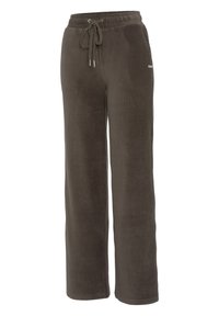 Brown corduroy pants with a loose fit, featuring a drawstring waistband and vertical ribbed texture. No prominent hardware or patterns.