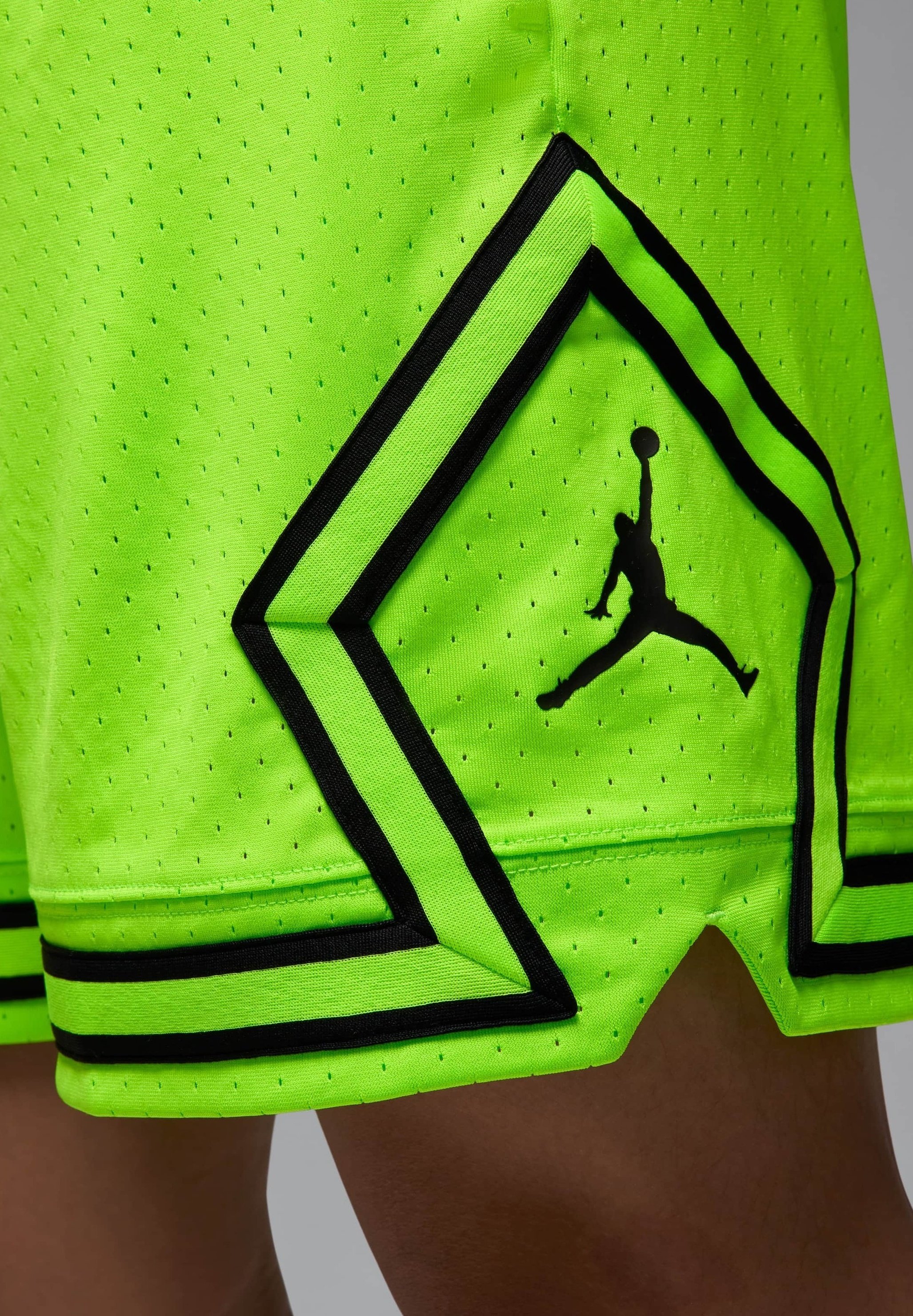 green and black jordan shorts