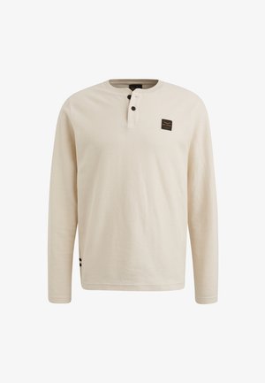 Crème kleurige henley shirt met lange mouwen, vervaardigd van textuurstof, met een drie-knops sluiting en een klein logo op de borst.