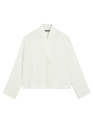 Haut kimono blanc à manches longues avec col large et coupe ample, présenté sur un fond blanc uni.