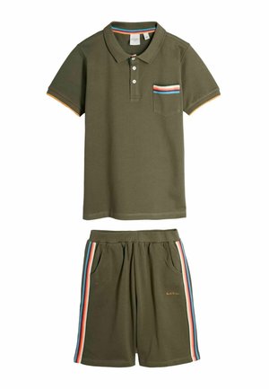Olive green polo shirt with striped pocket trim and matching shorts featuring multicolor side stripes and elastic waistband.
