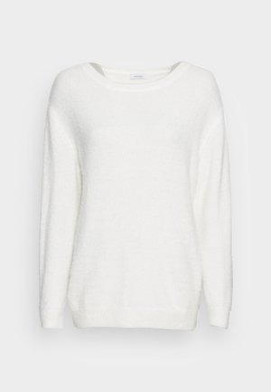 Pull en maille blanche avec une coupe décontractée, encolure ronde et manches longues. Tissu doux et texturé avec des poignets et un ourlet côtelés.