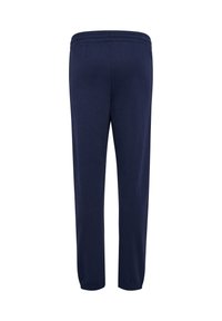 Marineblauwe trainingsbroek met een elastische tailleband, taps toelopende benen en manchetten aan de onderkant. Gemaakt van zacht materiaal met een gladde textuur.