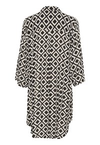 Sort og cremefarvet kimono med geometrisk diamantmønster, løs pasform, ærmer i midtlængde og krave. Bagsiden har en lodret søm.