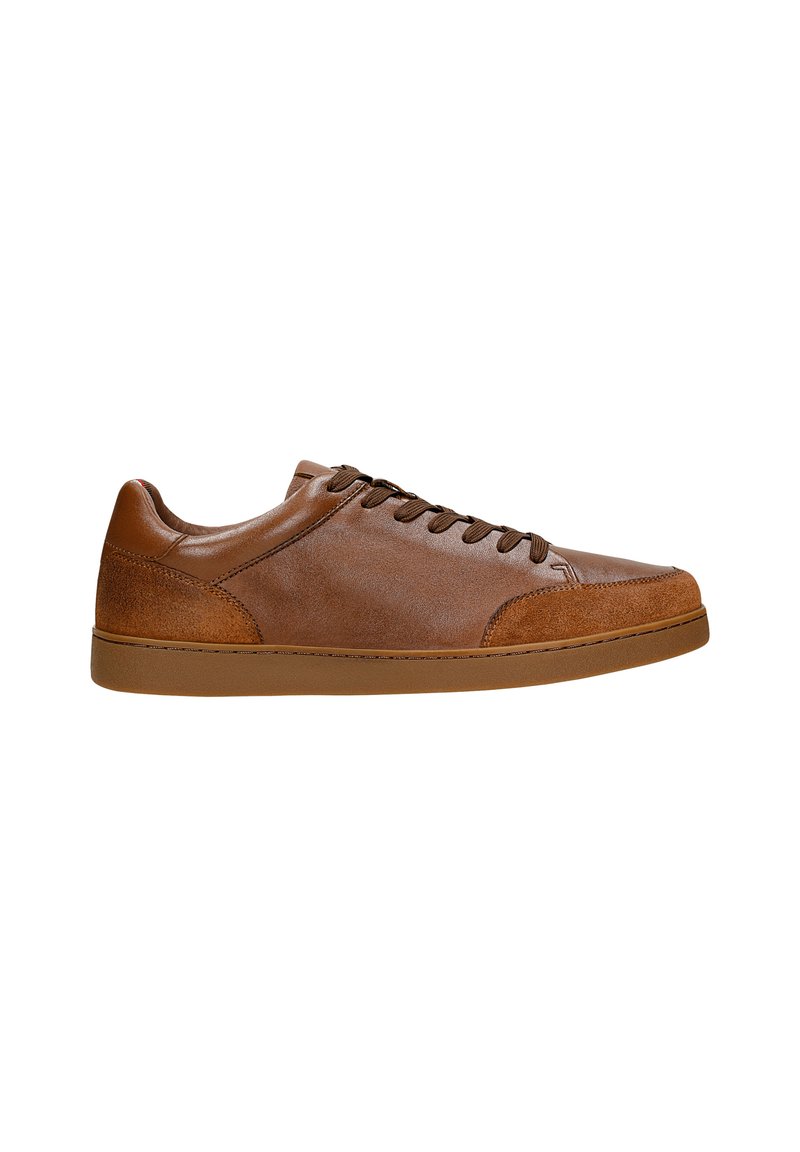 Brown leather sneakers featuring a smooth and textured finish, rounded toe, lace-up design, and a contrasting rubber sole.
