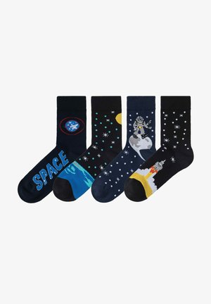 Four pairs of navy socks with space-themed designs: one features "SPACE" text, others depict planets, stars, and a rocket, varying in color and patterns.