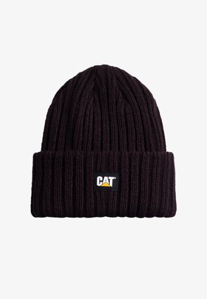 Dark purple knit beanie with ribbed texture, featuring a black rectangular patch with a yellow and white logo. Soft material for warmth.