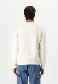 Calvin Klein NANO LOGO  - Melegítőfelső - vanilla ice