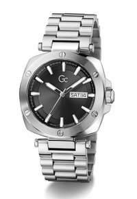 Reloj de pulsera para hombre de acero inoxidable con esfera negra, marcadores de hora plateados, indicador de día y fecha, y pulsera de eslabones metálicos.