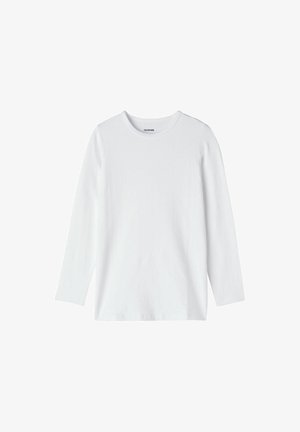 Witte langemouwen shirt van zacht katoen. Heeft een ronde hals en een rechte snit. Geen patronen of versieringen.