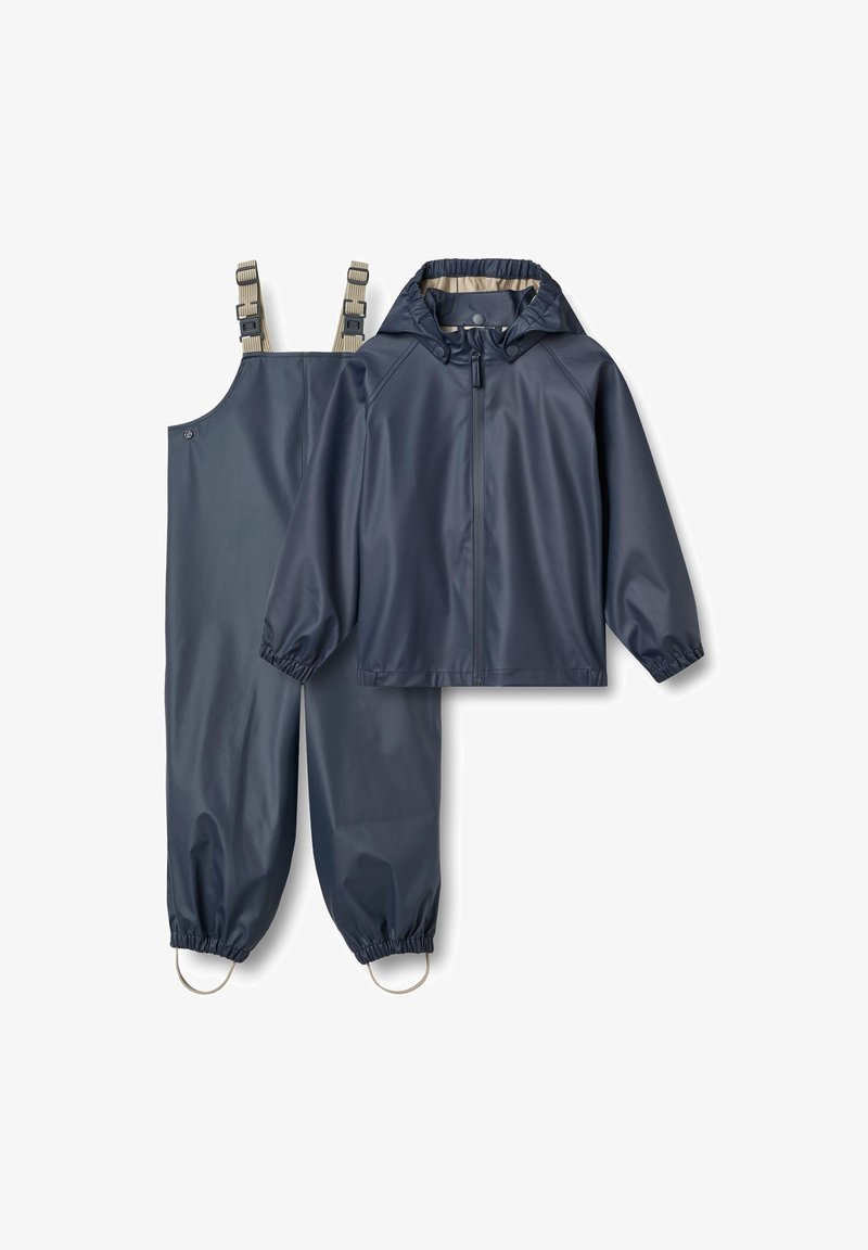 Navy blue waterproof jacket and overalls, made of smooth synthetic material. Features elastic cuffs, adjustable straps, and a molded zipper.