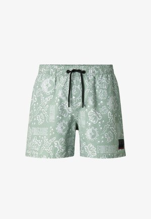Light green swim shorts with white floral and "FIRE & ICE" text patterns, elastic waistband, black drawstring, and small black logo patch.