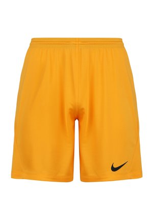 Hellgelbe Sportshorts mit elastischem Bund und schwarzem Nike-Logo am unteren linken Bein, dargestellt auf weißem Hintergrund.