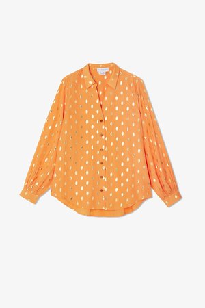 Orange long-sleeve shirt in lightweight fabric, featuring gold polka dots, button front, and buttoned cuffs, with a relaxed fit design.