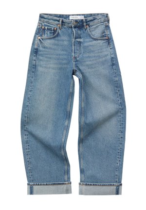 Blue denim jeans with a relaxed fit, five pockets, button and zipper closure, and rolled-up cuffs at the ankles.