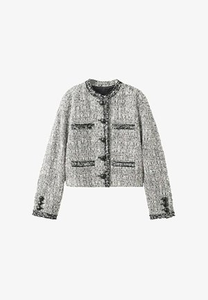 Veste en tweed gris et noir texturée avec col rond, cinq boutons noirs et quatre poches frontales avec détails boutonnés sur les manches.