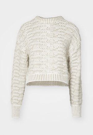 Creme strikket sweater med struktureret vævning, rund halsudskæring og ribkant i kanten og ærmerne. Cropped design med en afslappet pasform.