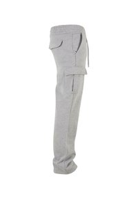 Grijze trainingsbroek met een elastische tailleband en zijzakken, voorzien van een cargozak op de bovenbeen en een taps toelopend ontwerp. Zachte textuur.
