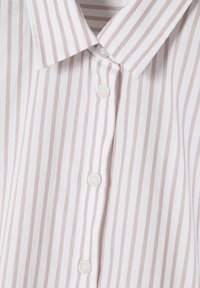 Striped shirt featuring light pink and white stripes, button closure, and a classic collar. Made of smooth cotton fabric.