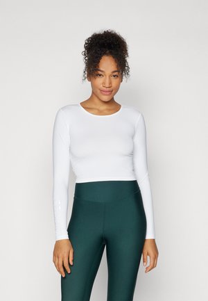 Casall GRAPHIC CROP LONG SLEEVE - Long sleeved top - white