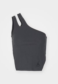 Top in cotone nero a costine con un design asimmetrico unico, dotato di una spallina larga e una stretta, include un piccolo logo all'orlo.