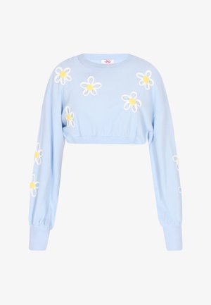 Jasnoniebieski krótki sweter z długimi rękawami, z białymi i żółtymi haftowanymi stokrotkami, prążkowanymi mankietami oraz okrągłym dekoltem.