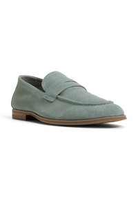 Light green suede loafers with perforated texture, slip-on design, and rubber sole. Features a stitched accent over the vamp.